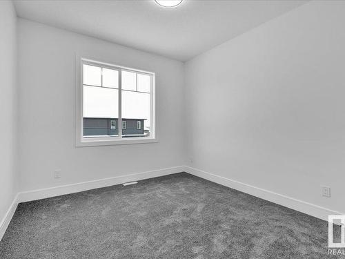 1109 Gyrfalcon Crescent, Edmonton, AB - Indoor Photo Showing Other Room