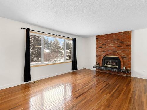 188 Marion Drive, Sherwood Park, AB - Indoor Photo Showing Living Room With Fireplace