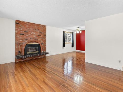 188 Marion Drive, Sherwood Park, AB - Indoor Photo Showing Living Room With Fireplace