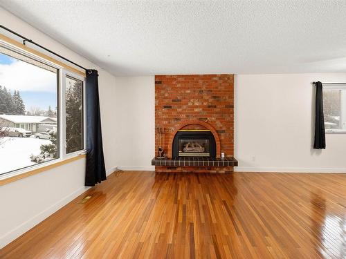 188 Marion Drive, Sherwood Park, AB - Indoor Photo Showing Living Room With Fireplace