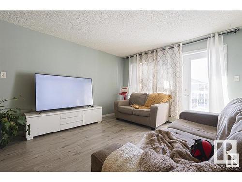 328 5350 199 Street Nw, Edmonton, AB - Indoor Photo Showing Living Room