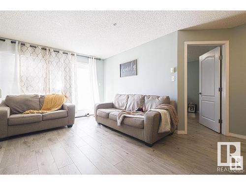 328 5350 199 Street Nw, Edmonton, AB - Indoor Photo Showing Living Room