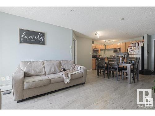 328 5350 199 Street Nw, Edmonton, AB - Indoor Photo Showing Living Room