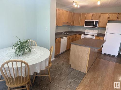 7932 2 Avenue, Edmonton, AB - Indoor Photo Showing Kitchen With Double Sink