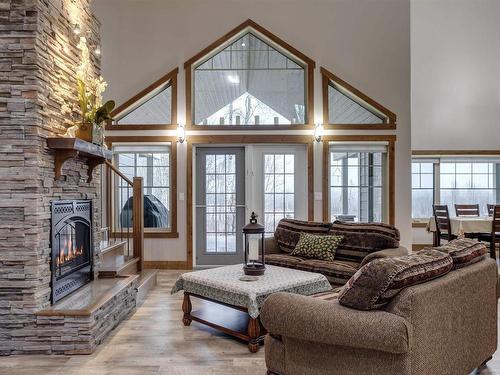 7126 Township Road 514, Rural Parkland County, AB - Indoor Photo Showing Living Room With Fireplace