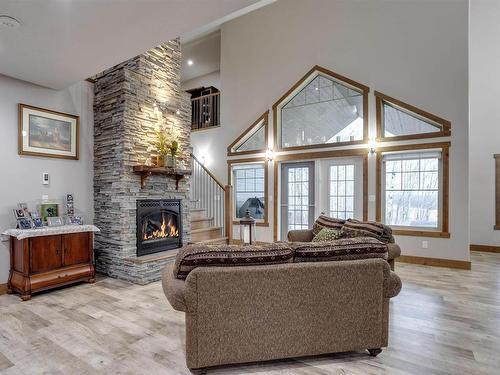 7126 Township Road 514, Rural Parkland County, AB - Indoor Photo Showing Living Room With Fireplace