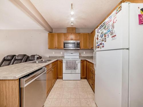 5 16823 84 Street Nw, Edmonton, AB - Indoor Photo Showing Kitchen With Double Sink