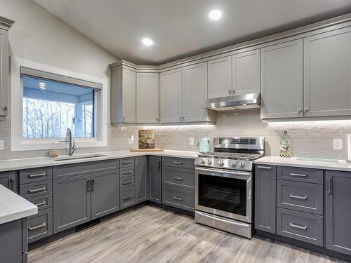 54 53004 Range Road 54A, Rural Parkland County, AB - Indoor Photo Showing Kitchen With Upgraded Kitchen