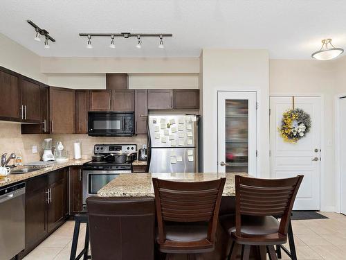 116 2035 Grantham Court, Edmonton, AB - Indoor Photo Showing Kitchen With Double Sink