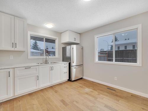 158 Porter Avenue, Millet, AB - Indoor Photo Showing Kitchen With Double Sink