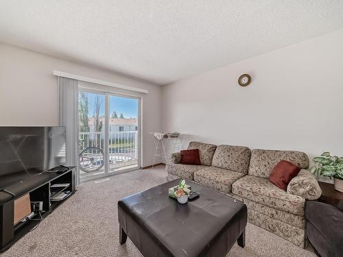 104 620 King Street, Spruce Grove, AB - Indoor Photo Showing Living Room