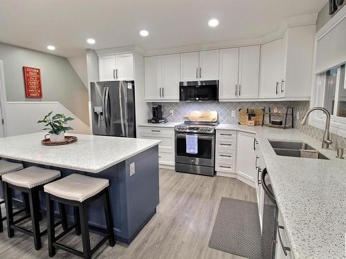 15 51122 Rge Road 265, Rural Parkland County, AB - Indoor Photo Showing Kitchen With Double Sink