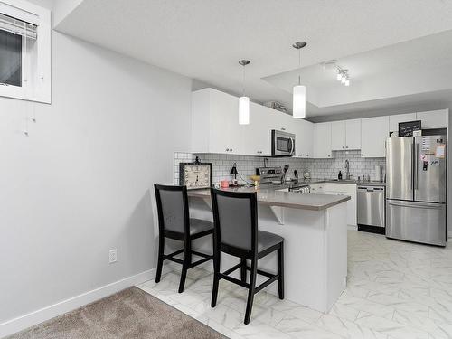 4613 66 Street, Beaumont, AB - Indoor Photo Showing Kitchen With Upgraded Kitchen