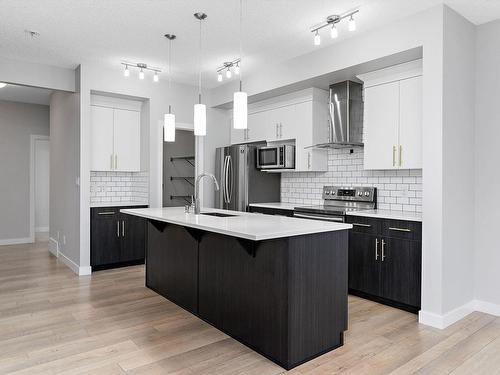 4613 66 Street, Beaumont, AB - Indoor Photo Showing Kitchen With Upgraded Kitchen