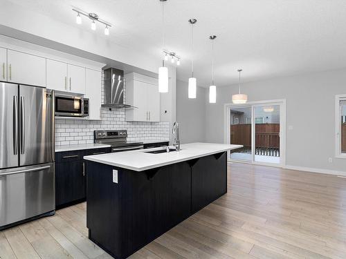 4613 66 Street, Beaumont, AB - Indoor Photo Showing Kitchen With Upgraded Kitchen