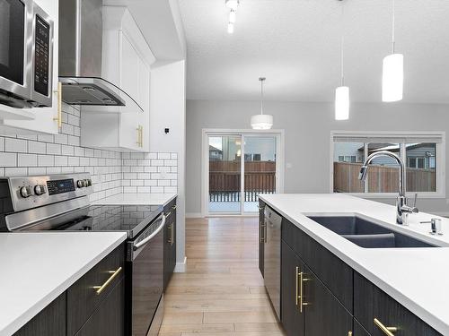 4613 66 Street, Beaumont, AB - Indoor Photo Showing Kitchen With Double Sink With Upgraded Kitchen