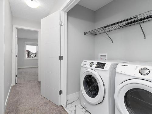 4613 66 Street, Beaumont, AB - Indoor Photo Showing Laundry Room