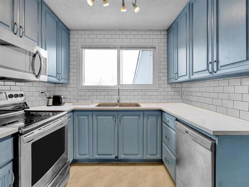 5219 45 Street, Stony Plain, AB - Indoor Photo Showing Kitchen With Double Sink