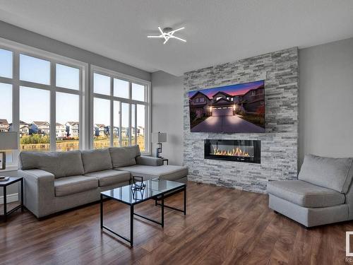 610 Eagleson Crescent, Edmonton, AB - Indoor Photo Showing Living Room With Fireplace