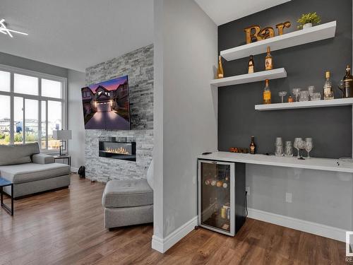 610 Eagleson Crescent, Edmonton, AB - Indoor Photo Showing Living Room With Fireplace