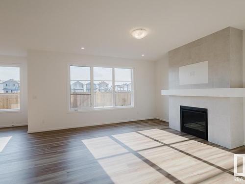 2027 208 Street, Edmonton, AB - Indoor Photo Showing Living Room With Fireplace