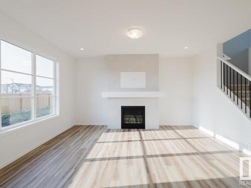 2027 208 Street, Edmonton, AB - Indoor Photo Showing Living Room With Fireplace