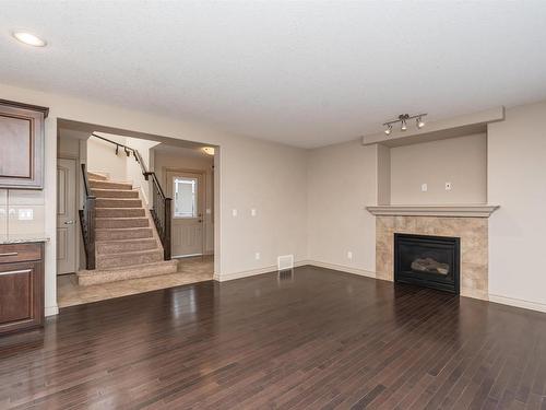 7330 Getty Heath, Edmonton, AB - Indoor Photo Showing Living Room With Fireplace