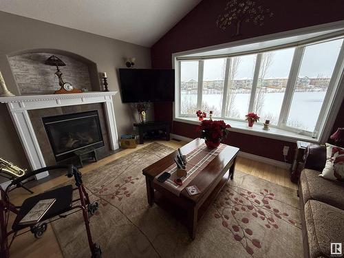 6208 53 Avenue, Beaumont, AB - Indoor Photo Showing Living Room With Fireplace