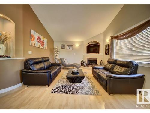 16220 49 Street, Edmonton, AB - Indoor Photo Showing Living Room With Fireplace