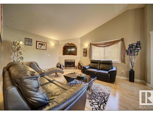 16220 49 Street, Edmonton, AB - Indoor Photo Showing Living Room With Fireplace