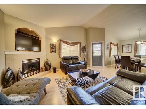 16220 49 Street, Edmonton, AB - Indoor Photo Showing Living Room With Fireplace