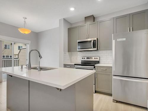 8 4835 Wright Drive, Edmonton, AB - Indoor Photo Showing Kitchen With Stainless Steel Kitchen With Double Sink With Upgraded Kitchen