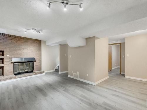 3833 85 Street, Edmonton, AB - Indoor With Fireplace