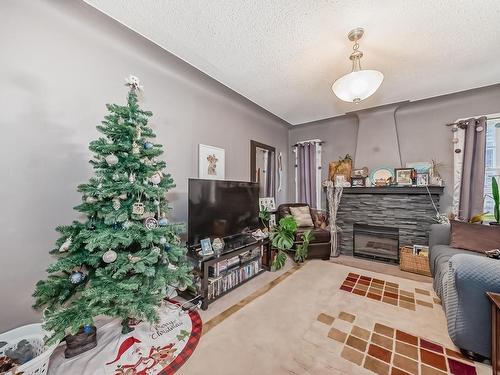 12430 76 Street, Edmonton, AB - Indoor Photo Showing Living Room With Fireplace