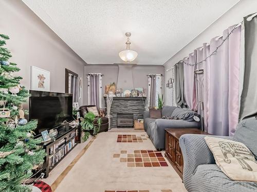 12430 76 Street, Edmonton, AB - Indoor Photo Showing Living Room With Fireplace