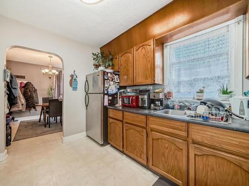 12430 76 Street, Edmonton, AB - Indoor Photo Showing Kitchen With Double Sink