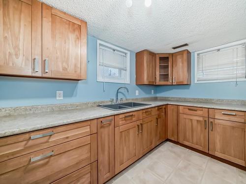 12430 76 Street, Edmonton, AB - Indoor Photo Showing Kitchen With Double Sink