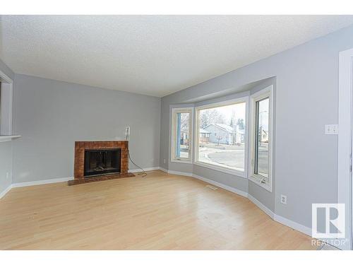 14540 20 Street, Edmonton, AB - Indoor Photo Showing Living Room With Fireplace