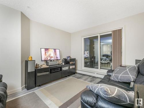 216 5510 Schonsee Drive, Edmonton, AB - Indoor Photo Showing Living Room