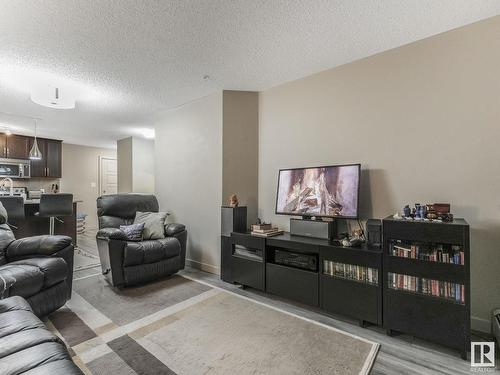 216 5510 Schonsee Drive, Edmonton, AB - Indoor Photo Showing Living Room