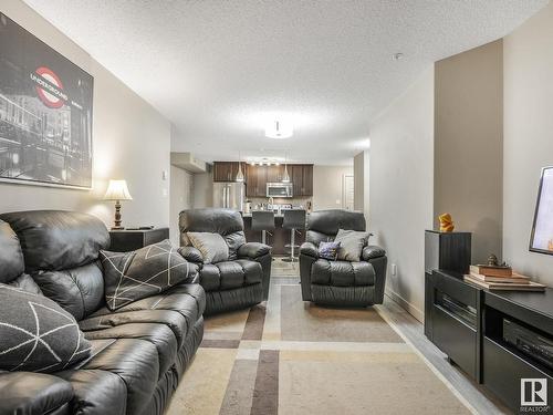 216 5510 Schonsee Drive, Edmonton, AB - Indoor Photo Showing Living Room