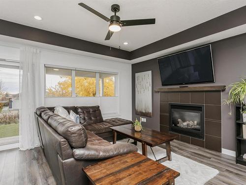 323 55101 Ste. Anne Trail, Rural Lac Ste. Anne County, AB - Indoor Photo Showing Living Room With Fireplace