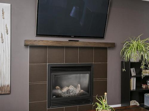 323 55101 Ste. Anne Trail, Rural Lac Ste. Anne County, AB - Indoor Photo Showing Living Room With Fireplace