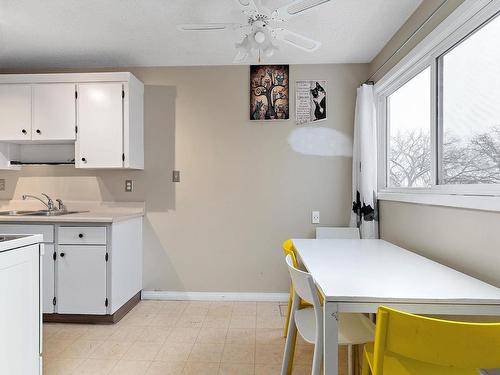 202 8310 Jasper Avenue, Edmonton, AB - Indoor Photo Showing Kitchen With Double Sink