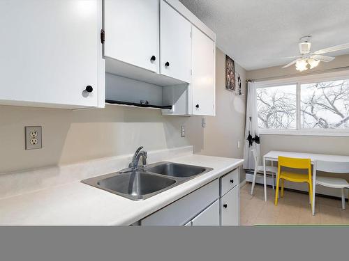 202 8310 Jasper Avenue, Edmonton, AB - Indoor Photo Showing Kitchen With Double Sink