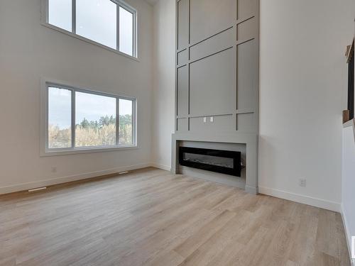 121 Starling Way, Fort Saskatchewan, AB - Indoor Photo Showing Living Room With Fireplace