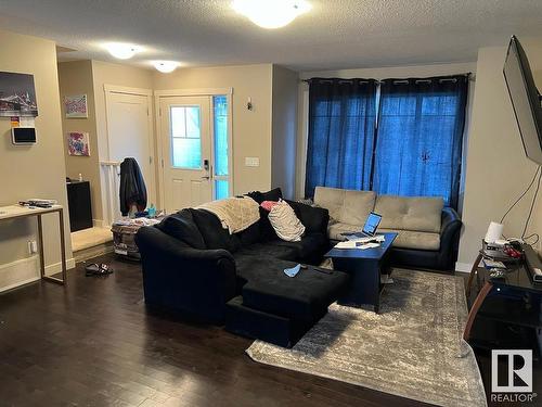 132 Cy Becker Boulevard, Edmonton, AB - Indoor Photo Showing Living Room