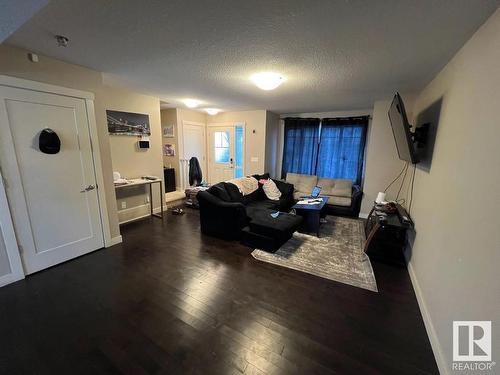 132 Cy Becker Boulevard, Edmonton, AB - Indoor Photo Showing Living Room