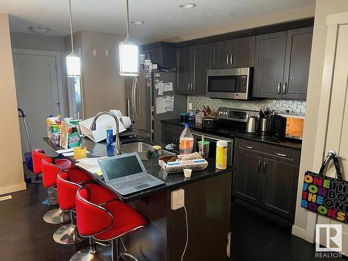 132 Cy Becker Boulevard, Edmonton, AB - Indoor Photo Showing Kitchen