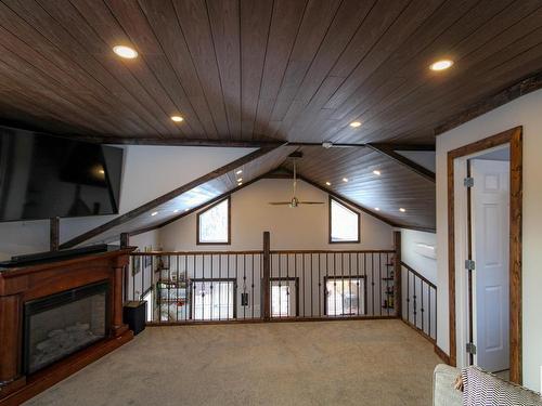 102 11502 Township Road 604, Rural St. Paul County, AB - Indoor Photo Showing Other Room With Fireplace